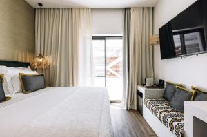 Кровать или кровати в номере AlmaLusa Comporta