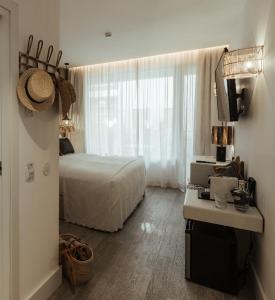 Кровать или кровати в номере AlmaLusa Comporta
