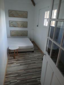 Postel nebo postele na pokoji v ubytování Les Coquelicot