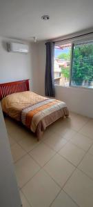 Ένα ή περισσότερα κρεβάτια σε δωμάτιο στο Apartment with Xochimilco garage