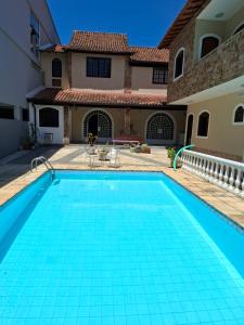 Πισίνα στο ή κοντά στο Casa Pouso Muriqui