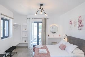 Giường trong phòng chung tại Sunny & Blue