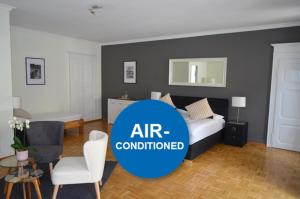 Postel nebo postele na pokoji v ubytování Boutique-Hotel Antica Posta