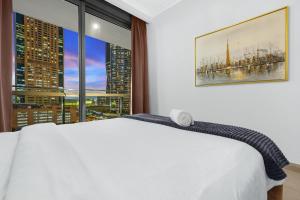 Postel nebo postele na pokoji v ubytování FIRST CLASS 1BR with DUBAI SKYLINE view + 25 fotografií
