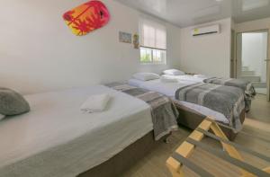 Cama ou camas em um quarto em Hotel Las Lunas