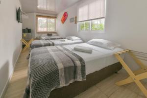 Cama ou camas em um quarto em Hotel Las Lunas