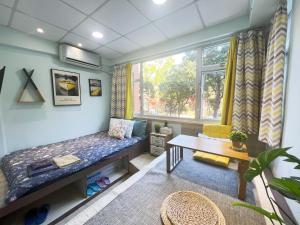 Istumisnurk majutusasutuses AMU Dreamhouse 阿木旅舍