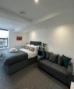 Postel nebo postele na pokoji v ubytování Flat 4 - Eign St Hereford