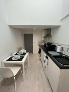 Kuchyň nebo kuchyňský kout v ubytování Flat 4 - Eign St Hereford