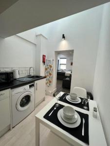 Kuchyň nebo kuchyňský kout v ubytování Flat 4 - Eign St Hereford