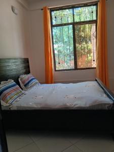 Postel nebo postele na pokoji v ubytování Hidalgo Explorers Home