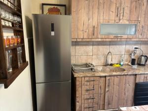 A kitchen or kitchenette at ''Mary's House'' Entire residence Olympiada Halkidiki Near to Sea 200m !