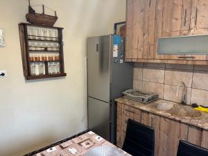A kitchen or kitchenette at ''Mary's House'' Entire residence Olympiada Halkidiki Near to Sea 200m !