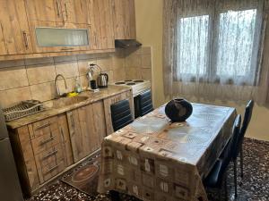 A kitchen or kitchenette at ''Mary's House'' Entire residence Olympiada Halkidiki Near to Sea 200m !