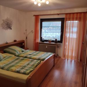 Postel nebo postele na pokoji v ubytování Säckingen 86 qm 3 Zimmer
