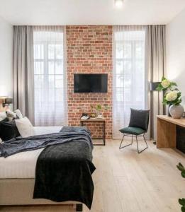 Postel nebo postele na pokoji v ubytování Hotel Jazz Market Square Wroclaw