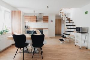 Kuchyň nebo kuchyňský kout v ubytování Modernes Penthouse mit Panorama im Herzen von Villingen