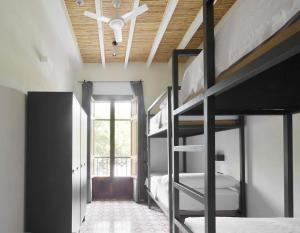 Postel nebo postele na pokoji v ubytování The Boc Hostels - Palma