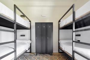 Postel nebo postele na pokoji v ubytování The Boc Hostels - Palma + 37 fotografií