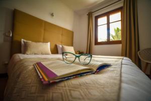 Łóżko lub łóżka w pokoju w obiekcie Agradable y familiar, con piscina "Casa Inima"