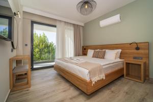 Postel nebo postele na pokoji v ubytování Ansira Fethiye