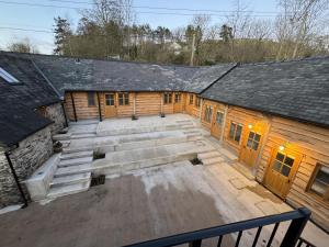 an aerial view of a wooden building with stairs at The Bridges in Shrewsbury