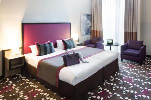 Postel nebo postele na pokoji v ubytování Mercure Hotel MOA Berlin