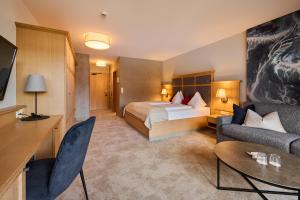 Postel nebo postele na pokoji v ubytování Landhotel Schermer