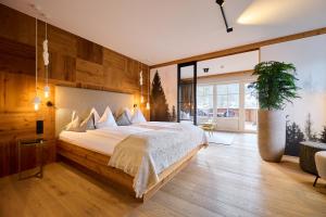 Postel nebo postele na pokoji v ubytování Landhotel Schermer