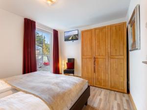 Ένα ή περισσότερα κρεβάτια σε δωμάτιο στο Ostseeresidenz Gorki- Park - 08 mit Wellness und Schwimmbad +22 φωτογραφίες