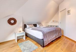 Ένα ή περισσότερα κρεβάτια σε δωμάτιο στο Residenz am Balmer See - BS 68 mit Wellnessbereich