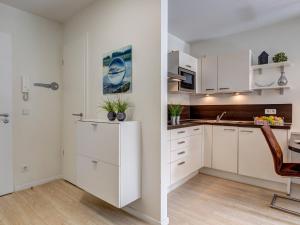 Kuchyň nebo kuchyňský kout v ubytování Residenz am Balmer See - BS 18H mit Wellnessbereich + 14 fotografií