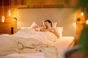 Postel nebo postele na pokoji v ubytování Landhotel Schermer