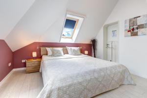 Ένα ή περισσότερα κρεβάτια σε δωμάτιο στο Residenz am Balmer See - BS 65 mit Wellnessbereich