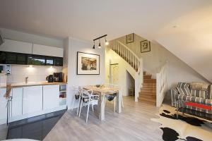 Kuchyň nebo kuchyňský kout v ubytování Residenz am Balmer See - BS 66 mit Wellnessbereich