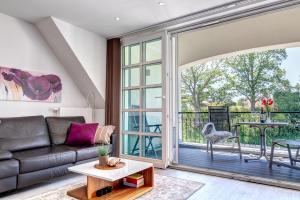 Et opholdsområde på Residenz am Balmer See - BS 70 mit Wellnessbereich