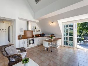 Kuchyň nebo kuchyňský kout v ubytování Residenz am Balmer See - BS 25 mit Wellnessbereich