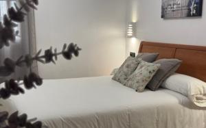 Postel nebo postele na pokoji v ubytování Hotel Ciudad Pozo Alcón