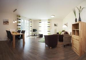 Khu vực ghế ngồi tại Residenz am Balmer See - BS 47 mit Wellnessbereich