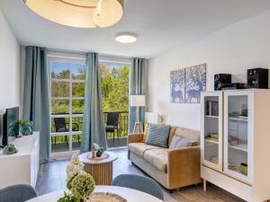 Μια τηλεόραση ή/και κέντρο ψυχαγωγίας στο Residenz am Balmer See - BS 54 mit Wellnessbereich
