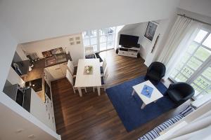 Μια τηλεόραση ή/και κέντρο ψυχαγωγίας στο Residenz am Balmer See - BS 62 mit Wellnessbereich