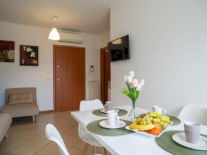 TV a/nebo společenská místnost v ubytování Apartment Le Dune by Interhome + 26 fotografií
