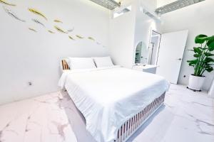 Postel nebo postele na pokoji v ubytování Fb Tailored Service Home Near Hongik Univ Station