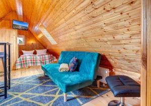 Posezení v ubytování Ferienhaus Renate Dachgeschosswohnung 4