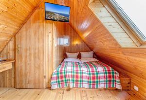 Postel nebo postele na pokoji v ubytování Ferienhaus Renate Dachgeschosswohnung 4