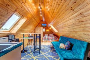 Posezení v ubytování Ferienhaus Renate Dachgeschosswohnung 4