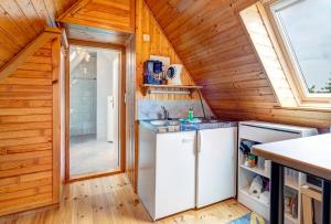 Kuchyň nebo kuchyňský kout v ubytování Ferienhaus Renate Dachgeschosswohnung 4