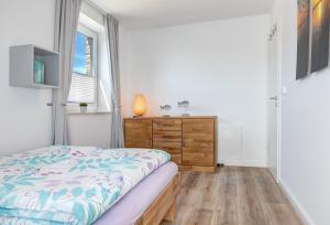 Postel nebo postele na pokoji v ubytování Haus Sternstunden