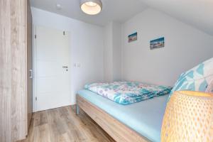 Postel nebo postele na pokoji v ubytování Haus Sternstunden