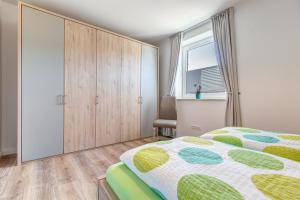 Postel nebo postele na pokoji v ubytování Haus Sternstunden